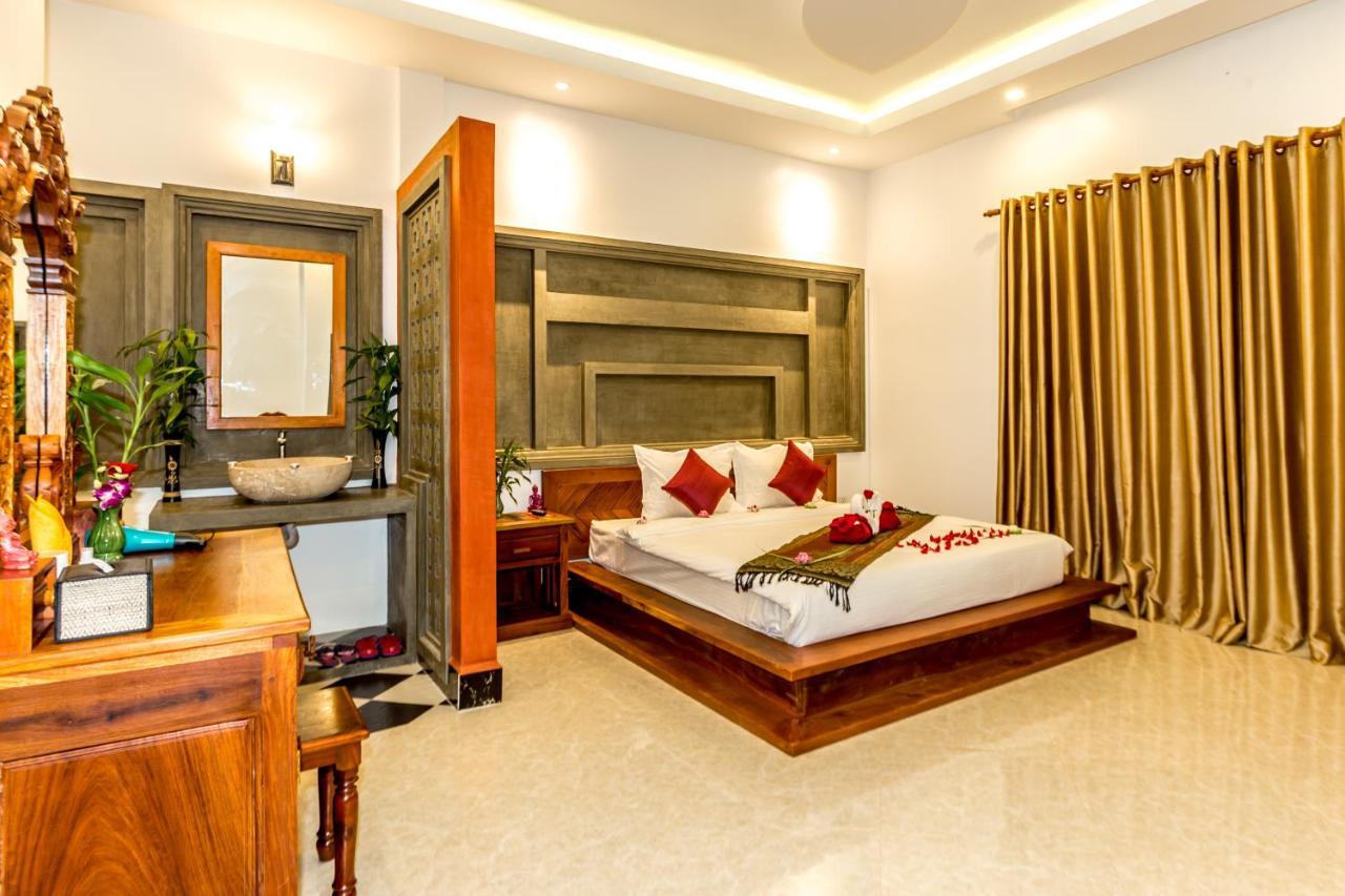 Ambient Angkor Boutique Hotel Siem Reap Quarto foto