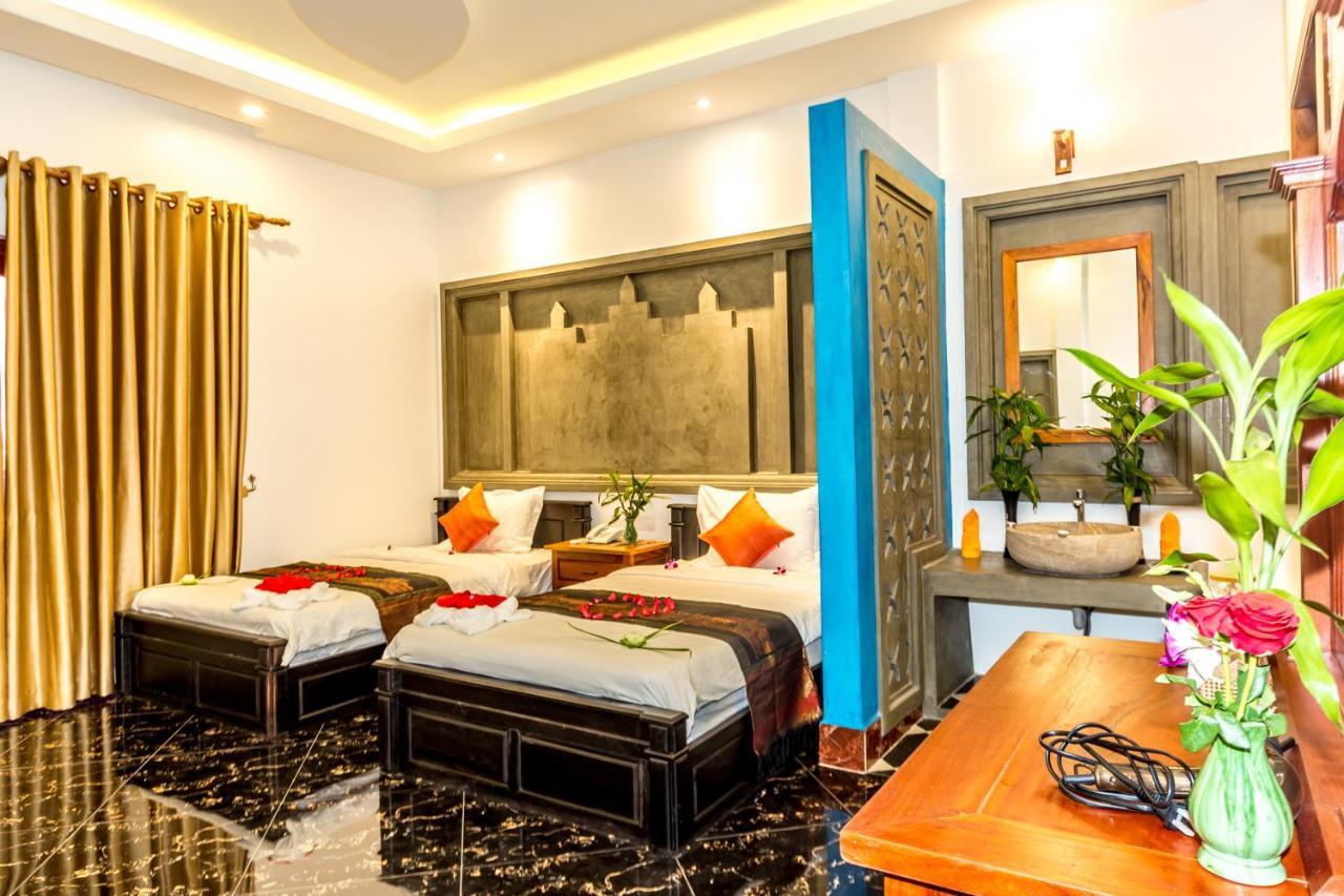 Ambient Angkor Boutique Hotel Siem Reap Quarto foto