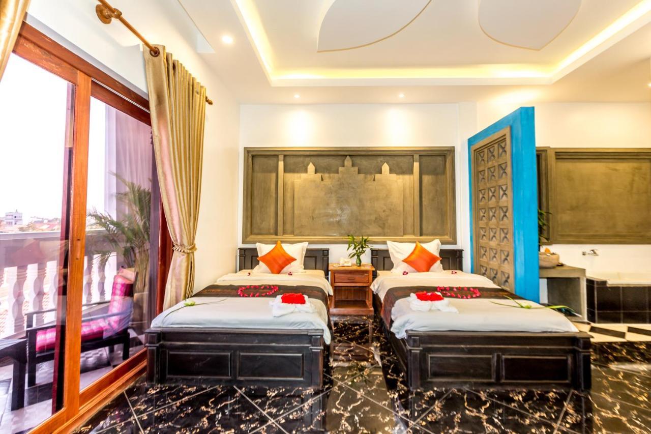 Ambient Angkor Boutique Hotel Siem Reap Quarto foto