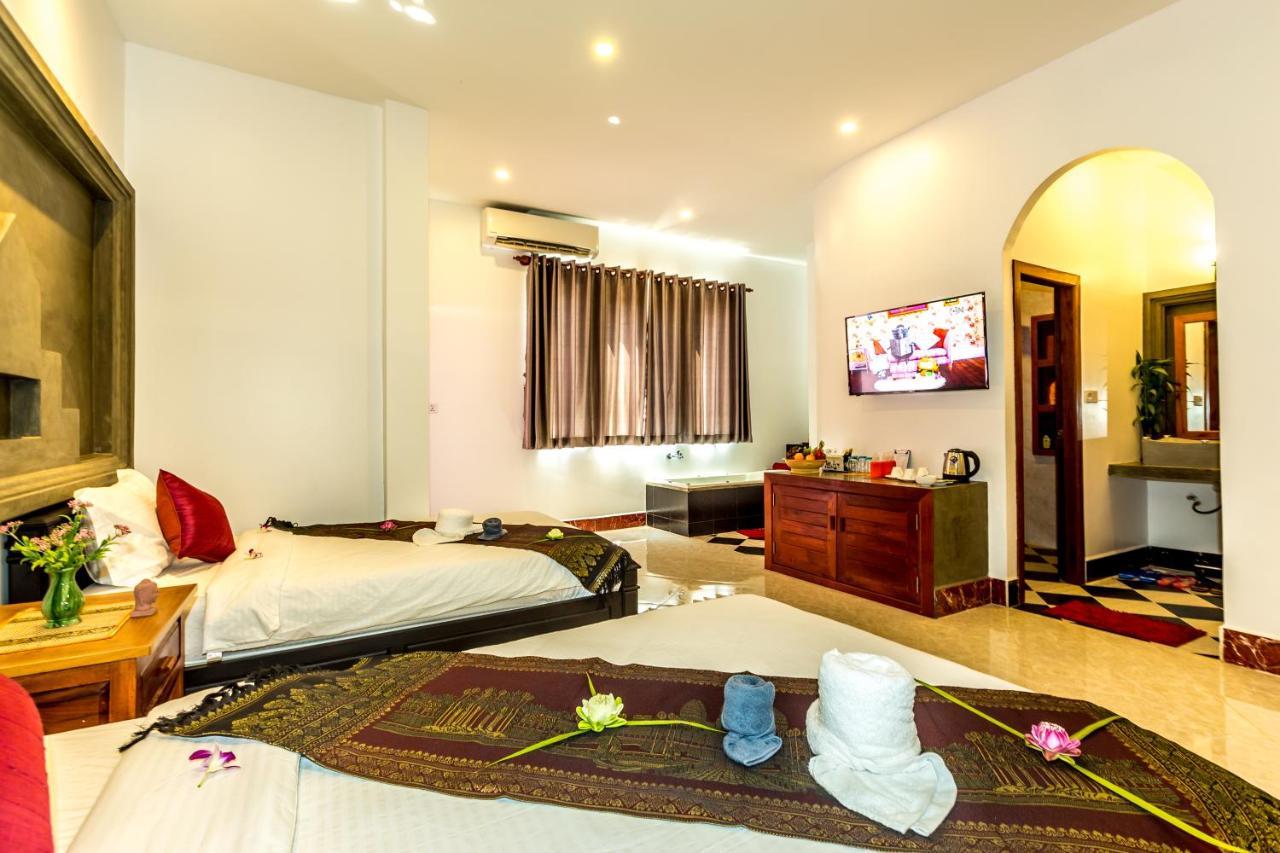 Ambient Angkor Boutique Hotel Siem Reap Quarto foto